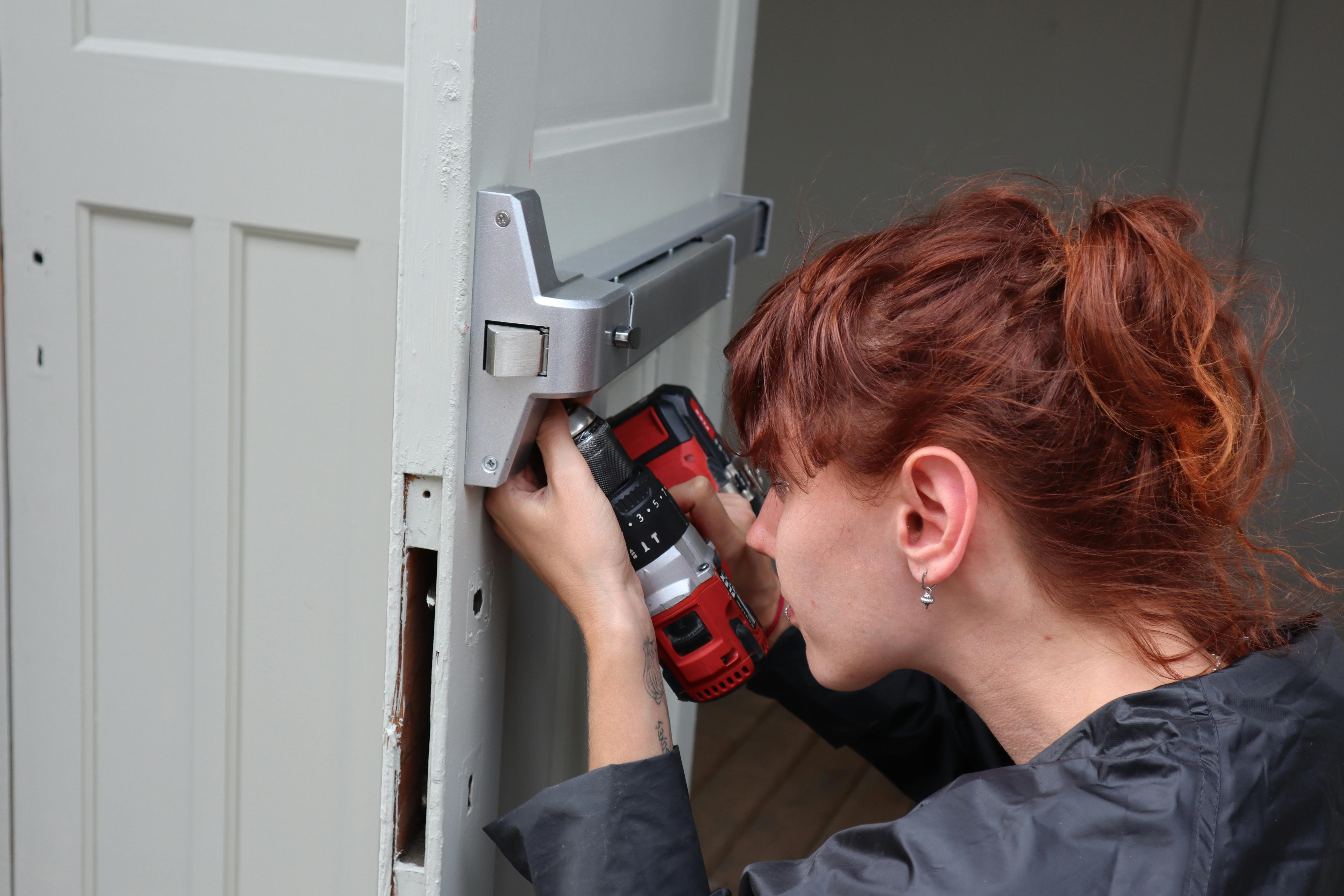 Woman doing home repairs